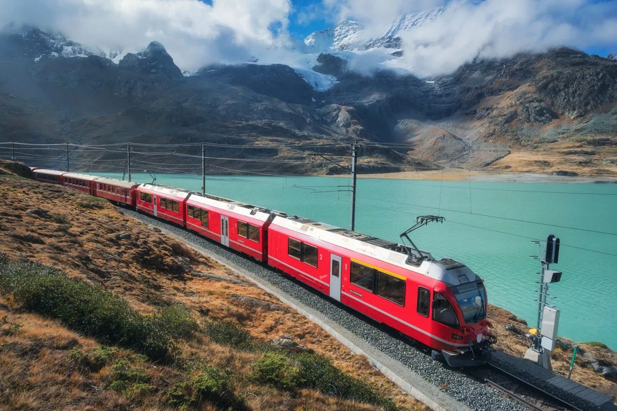 Red Train Is Moving Along Railway In Swiss Alps Mo 2025 03 18 21 28 42 Utc2 3